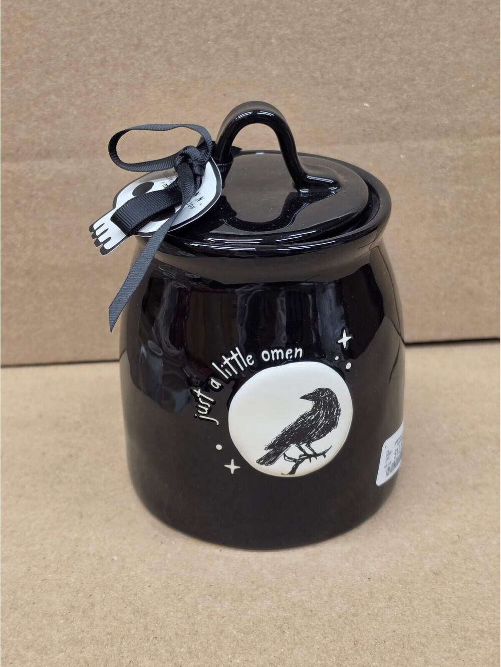 Just a little omen black canister with raven